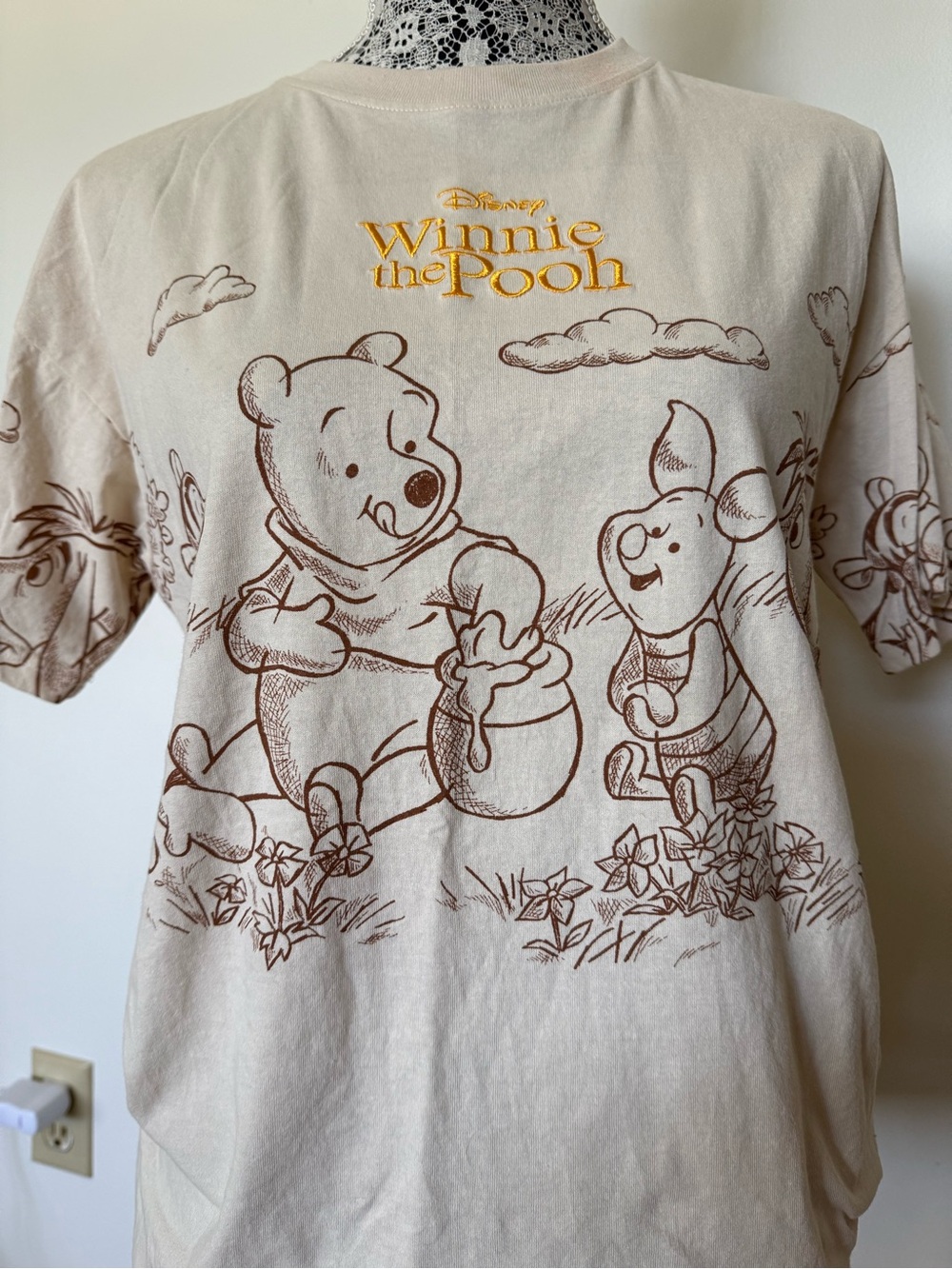 Disney Winnie the Pooh Beige Tee with Yellow Logo Trim